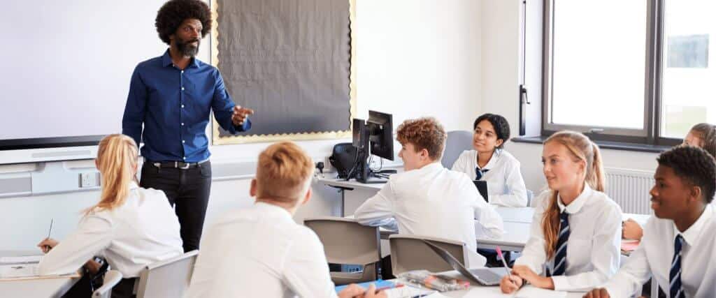 teacher pointing in classroom 2
